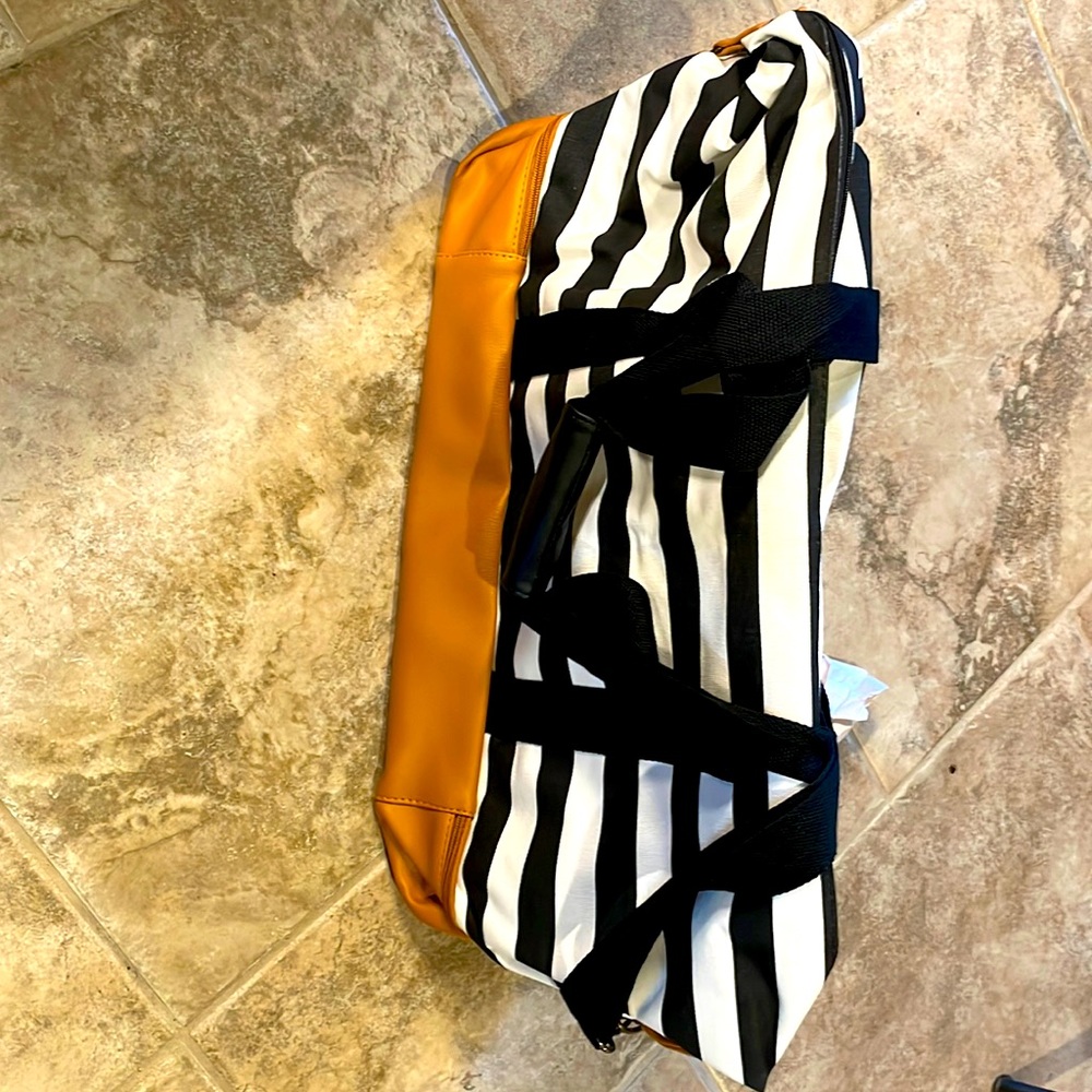 Nautical style canvas travel duffle. New in bag.